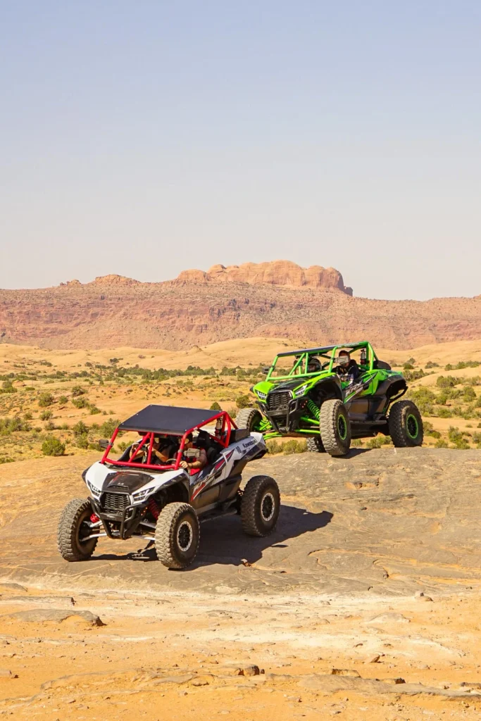 a couple of vehicles that are in the dirt